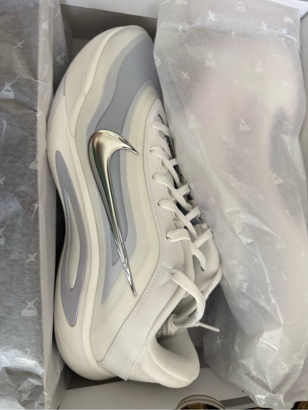 Nike Women’s White Sneakers with Iridescent Silver Swoosh